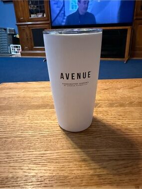 a white, double-wall vacuum insulated stainless steel travel tumbler “Avenue”